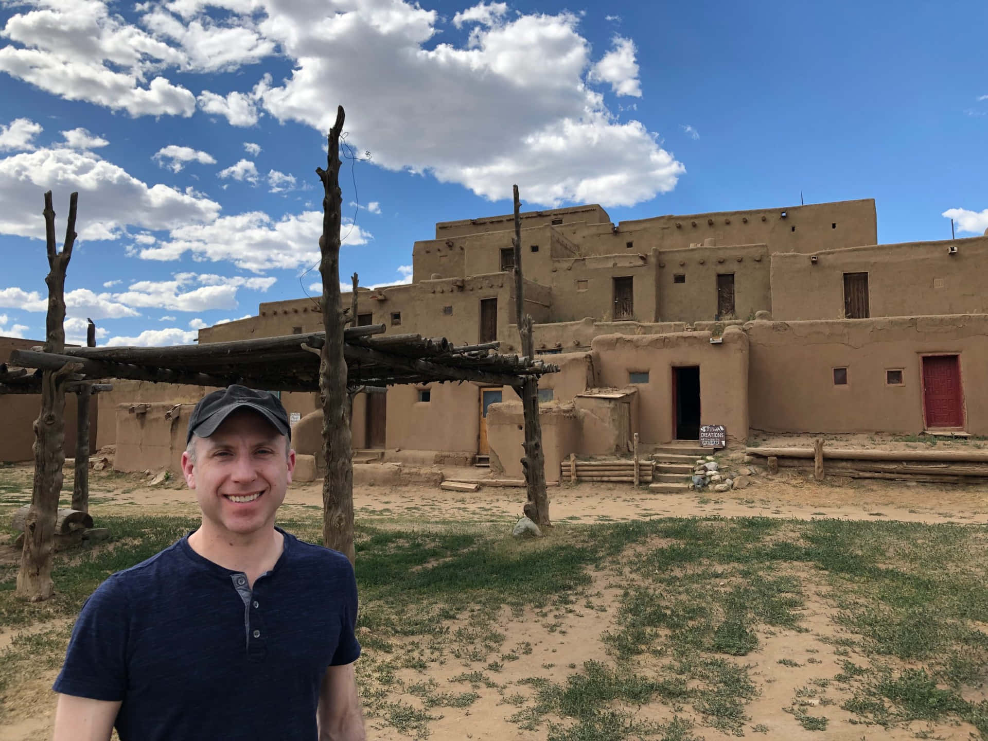 Explorer At Taos Pueblo Background