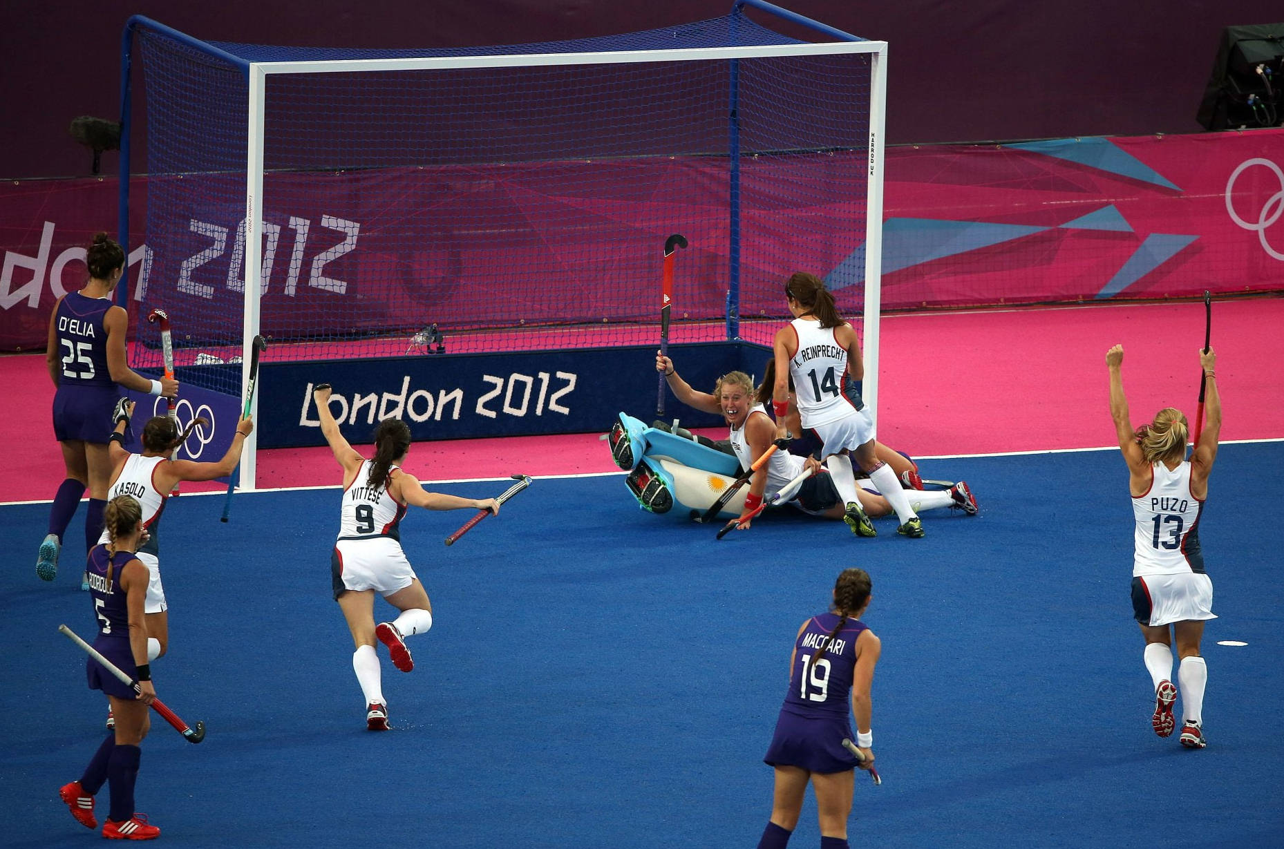 Explosive Field Hockey Match At The 2012 Olympic Games Background