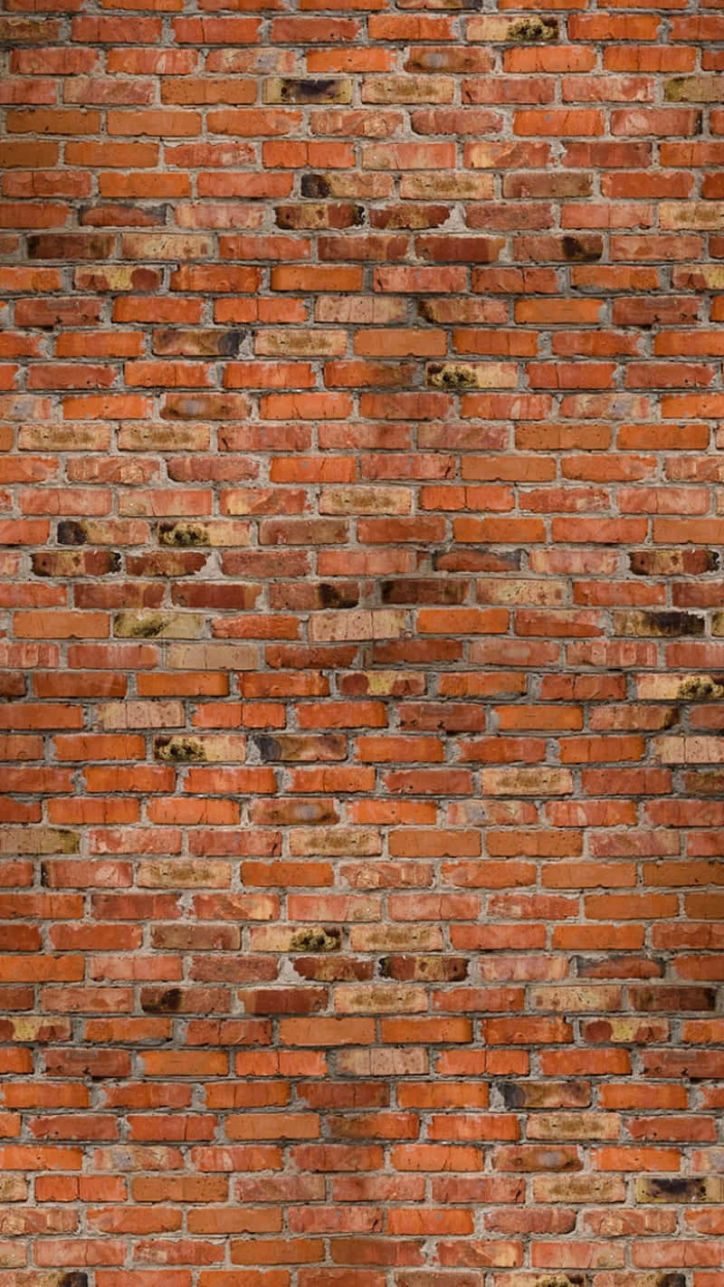 Exposed Stained Brick Wall Background
