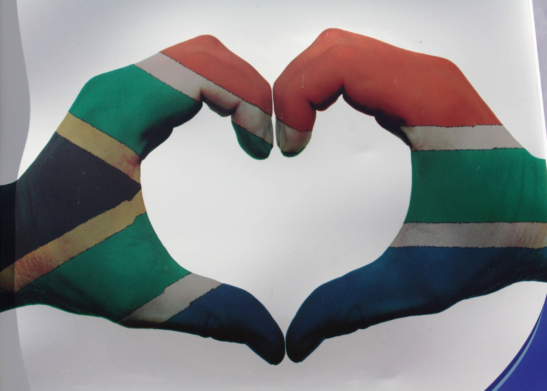 Expressing Love Through Hand Heart Shape Against South African Landscape Background