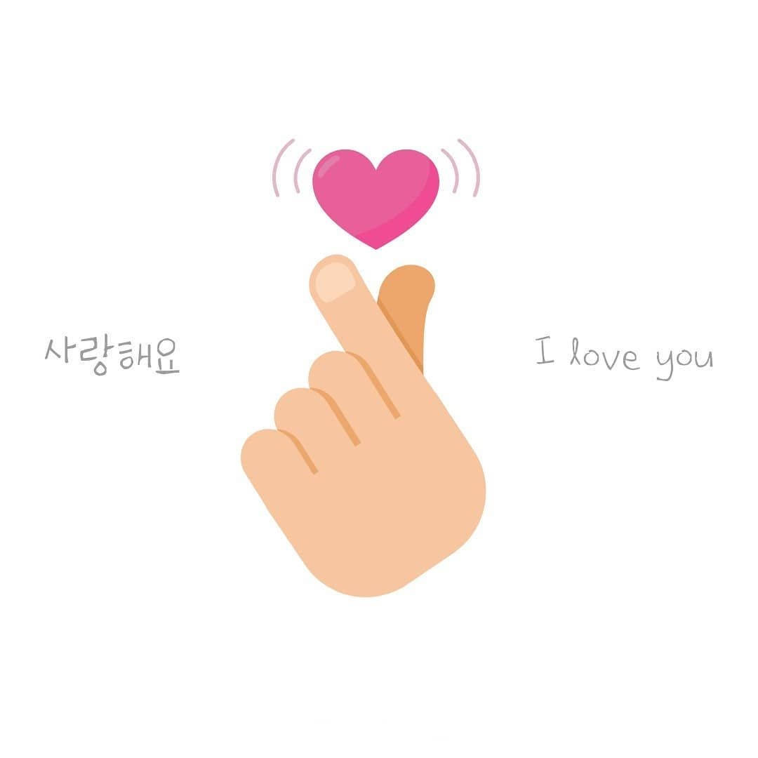 Expressing Love With A Korean Finger Heart Gesture