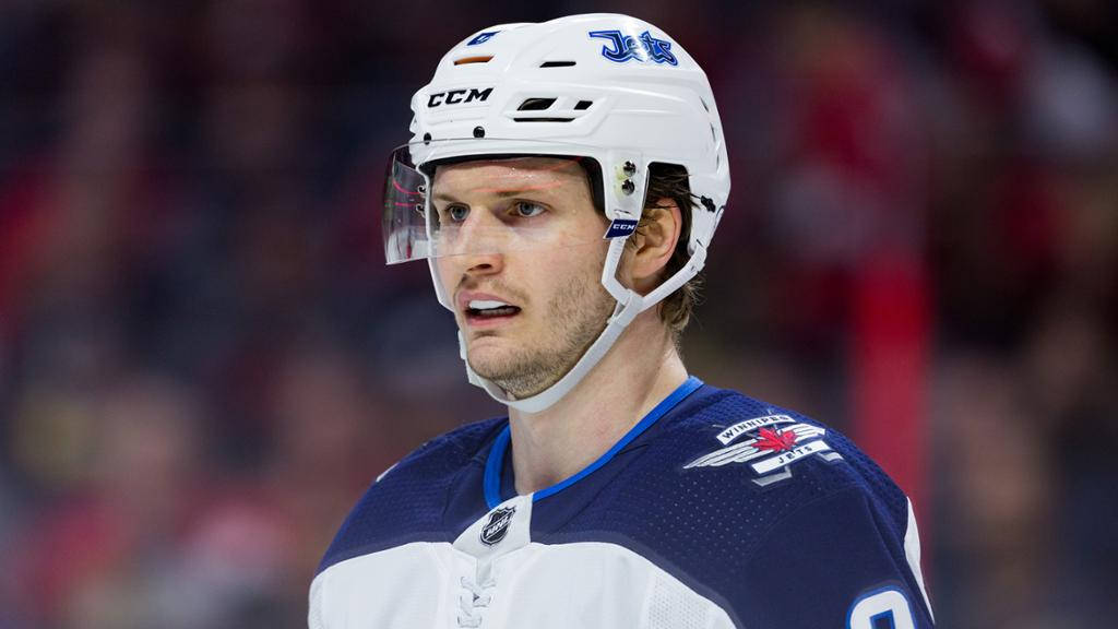 Expressive Close-up Of Nhl Star Jacob Trouba Background