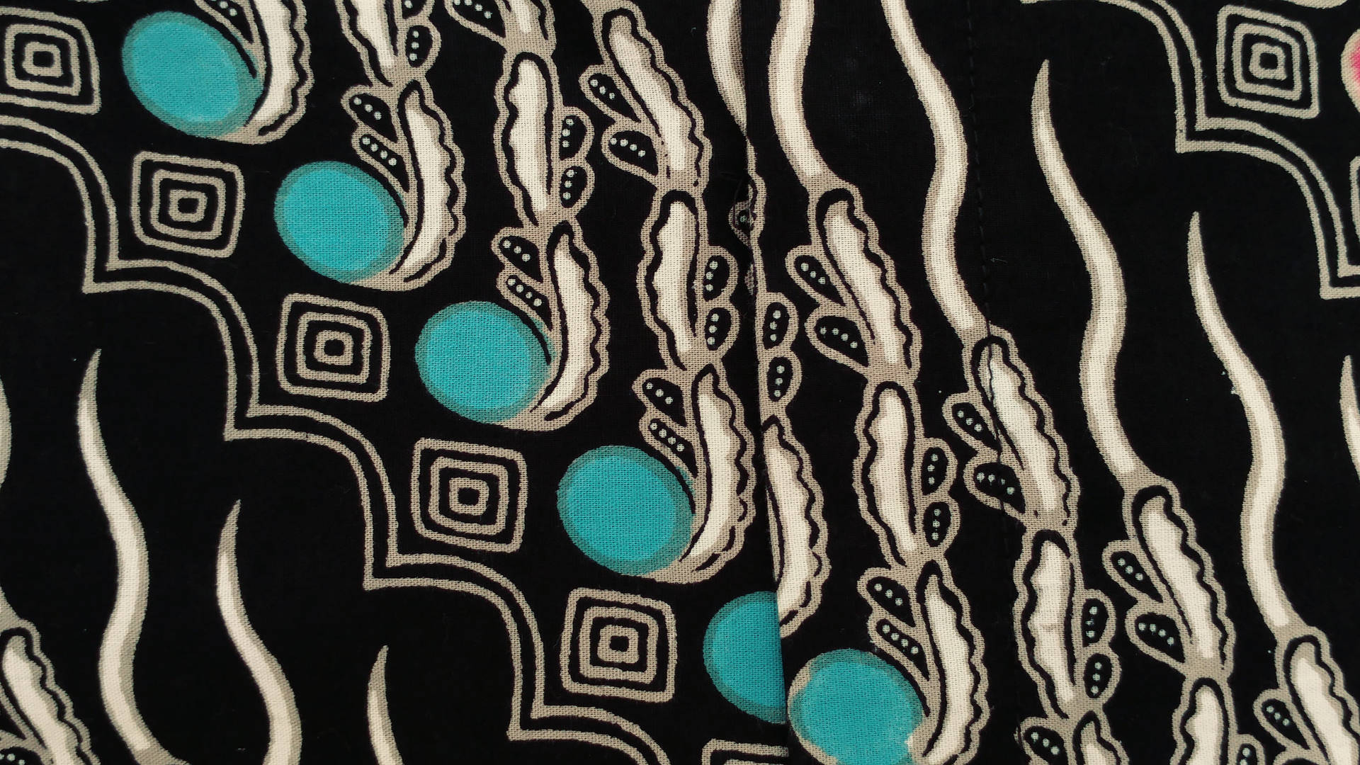 Exquisite Batik Creation With Turquoise Beads Background