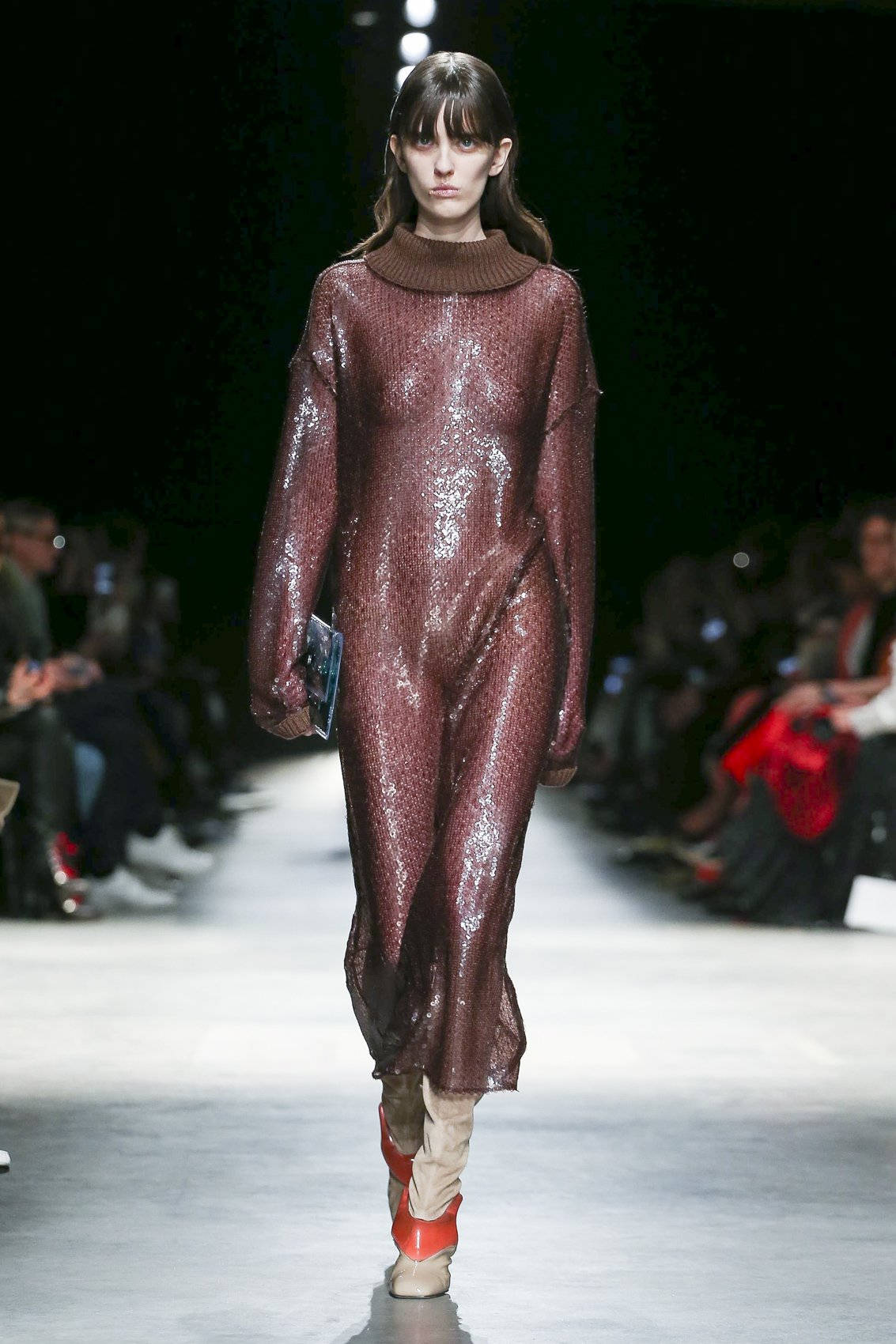 Exquisite Brown Glimmering Dress By Christopher Kane Background