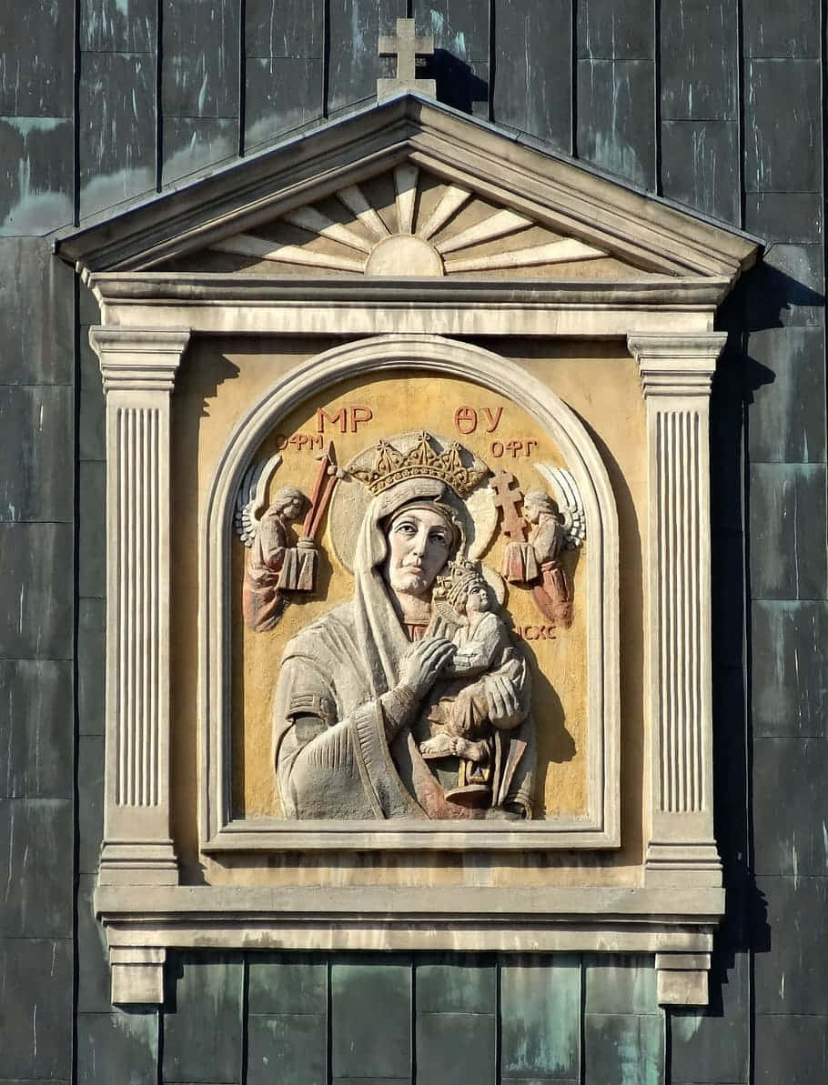 Exquisite Carving Of Our Lady Of Perpetual Help Background