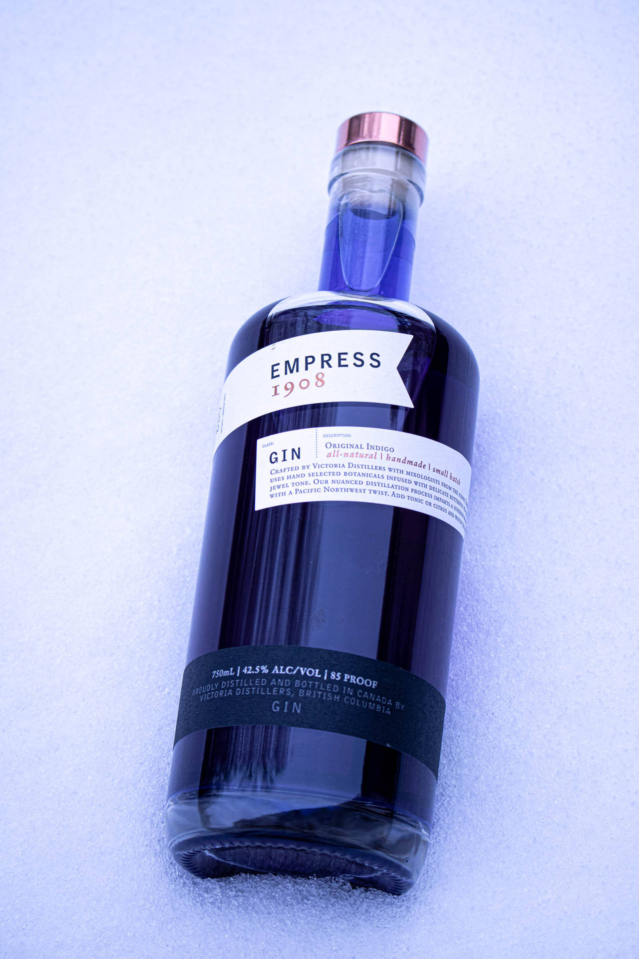 Exquisite Empress 1908 Gin On Crispy Crushed Ice Background