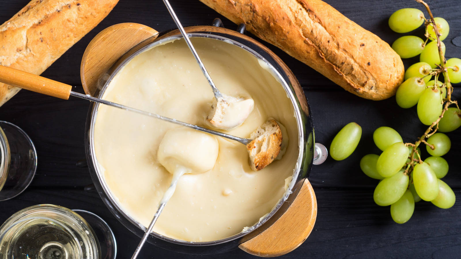 Exquisite Fondue With Fresh French Baguette Background