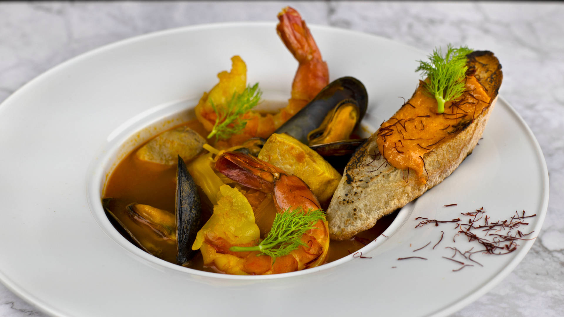 Exquisite French Bouillabaisse In Fine Dining Setting Background