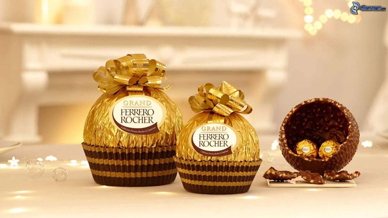 Exquisite Gold Foil Packaging Of Ferrero Rocher Chocolates Background