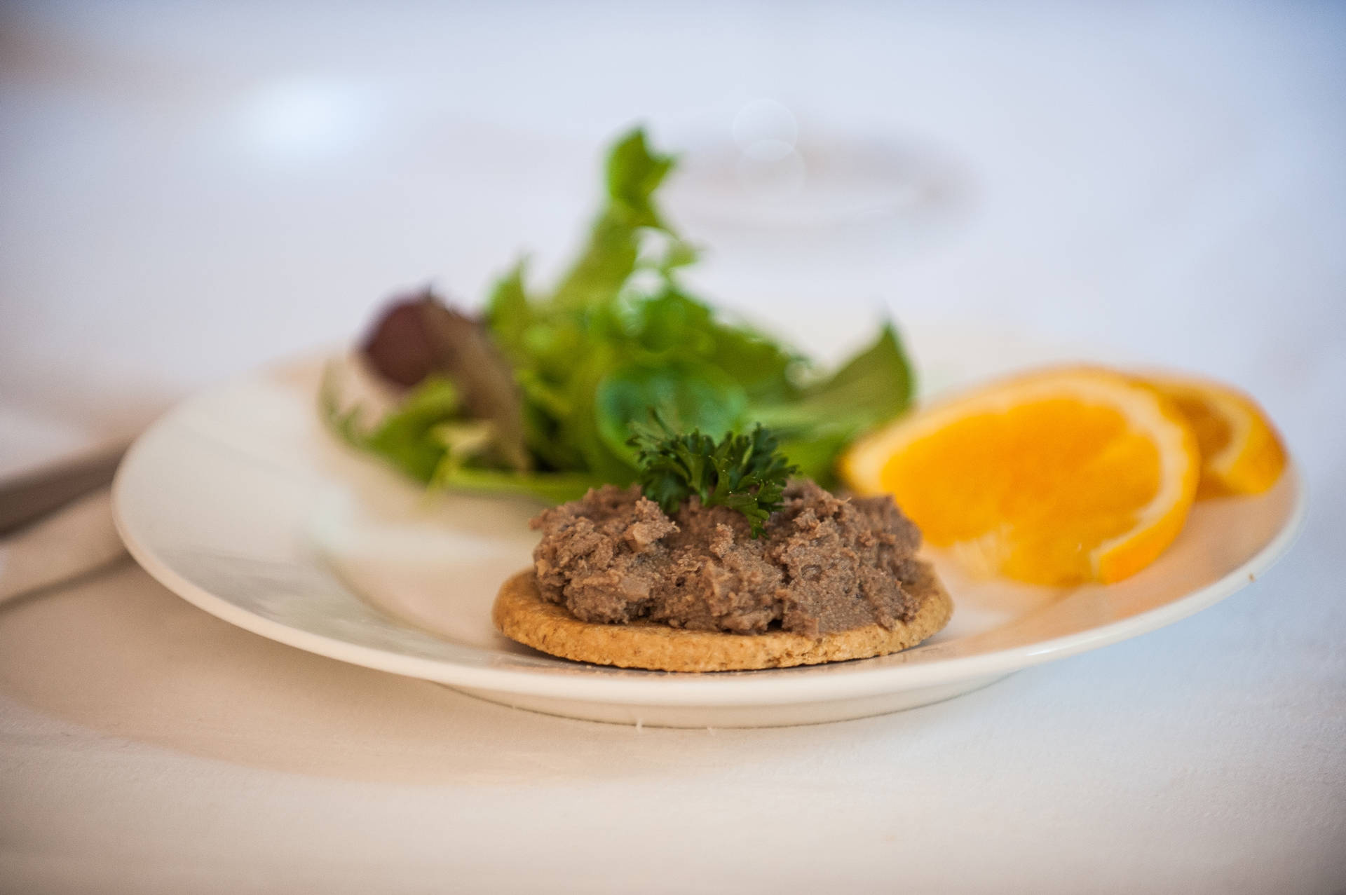 Exquisite Liver Spread On Biscuit Paired With Fresh Oranges