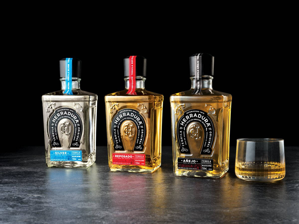 Exquisite Miniature Herradura Tequila Bottle Background