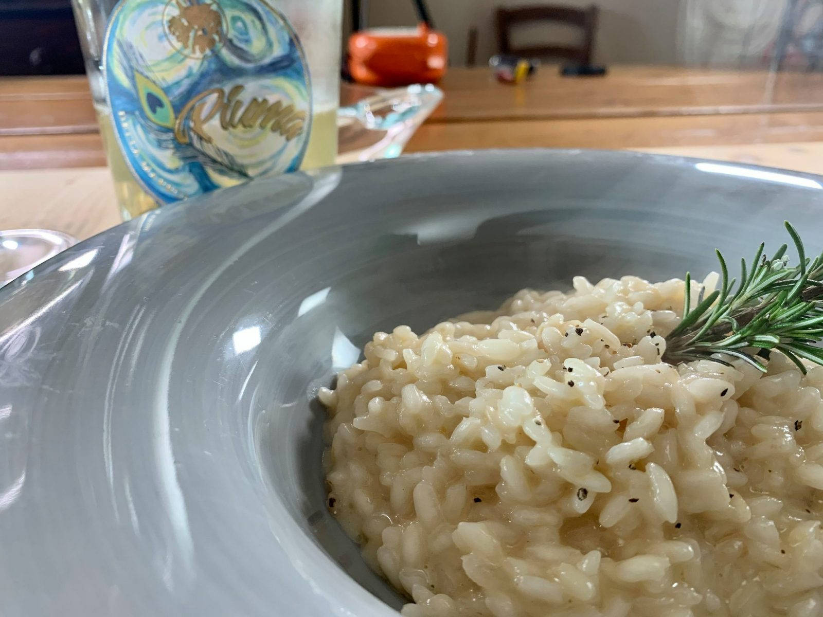 Exquisite Risotto With Fresh Rosemary And Pepper Background