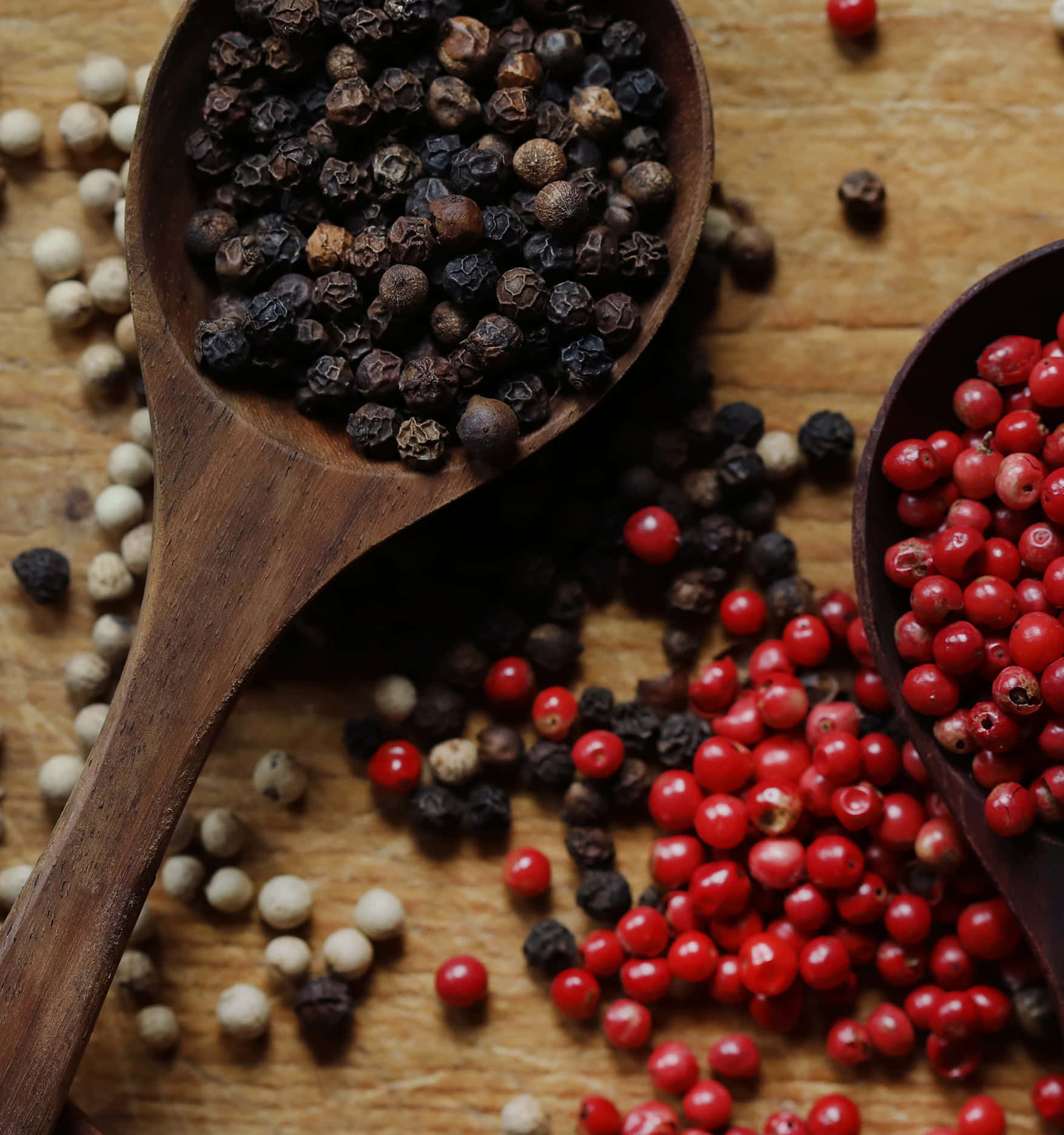 Exquisite Selection Of Spices - Black Pepper And Red Forest Cranberry Background