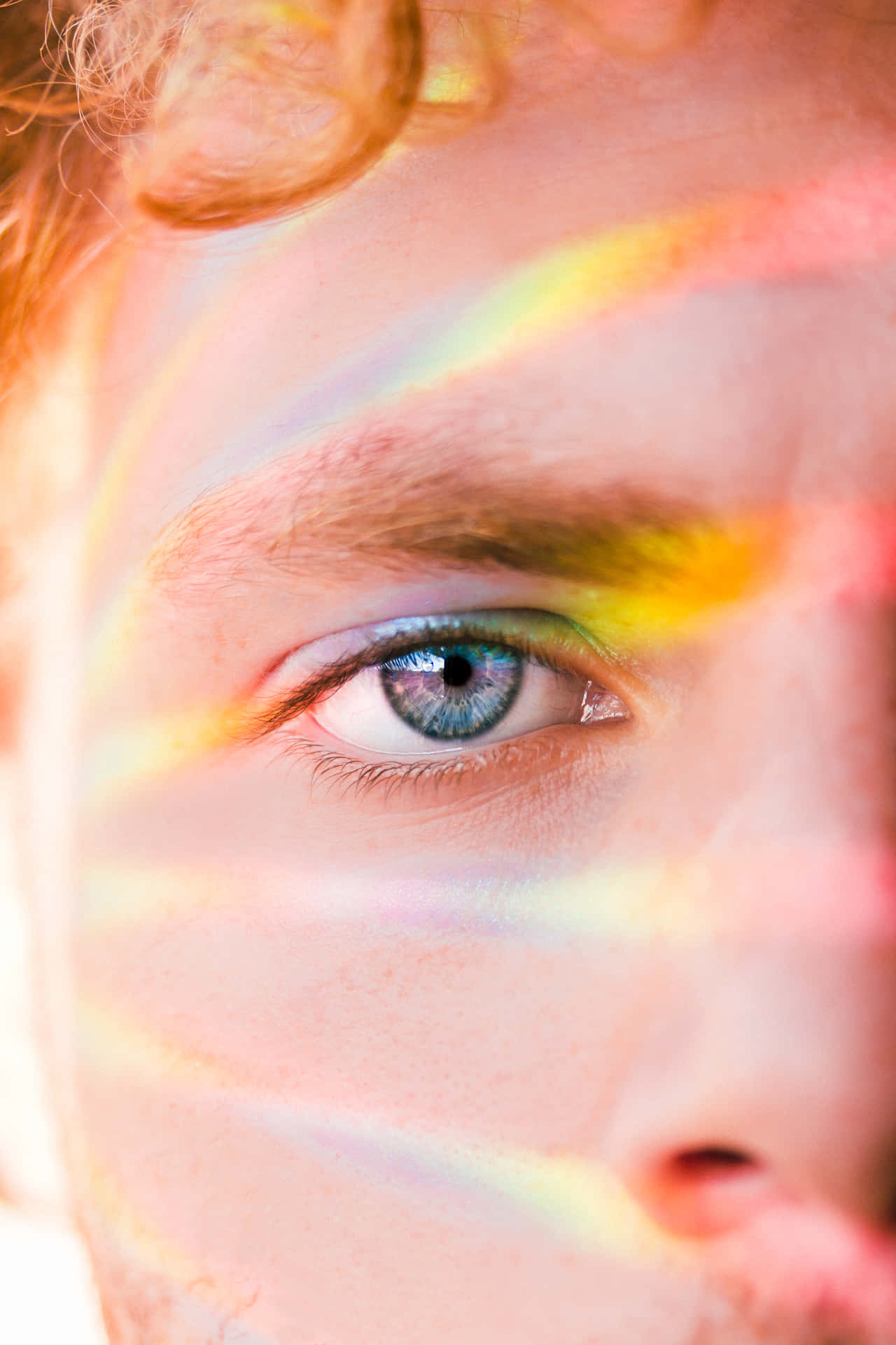 Eye Closeup With Rainbow Ray Lights