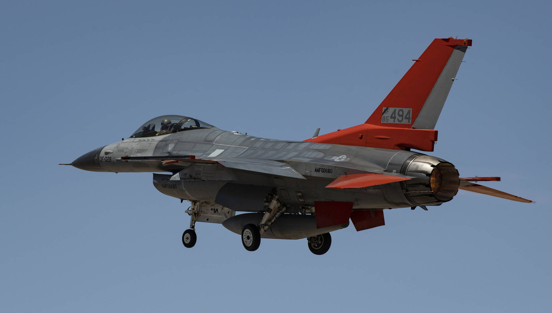 F-16 Fighter Jet In Red Background