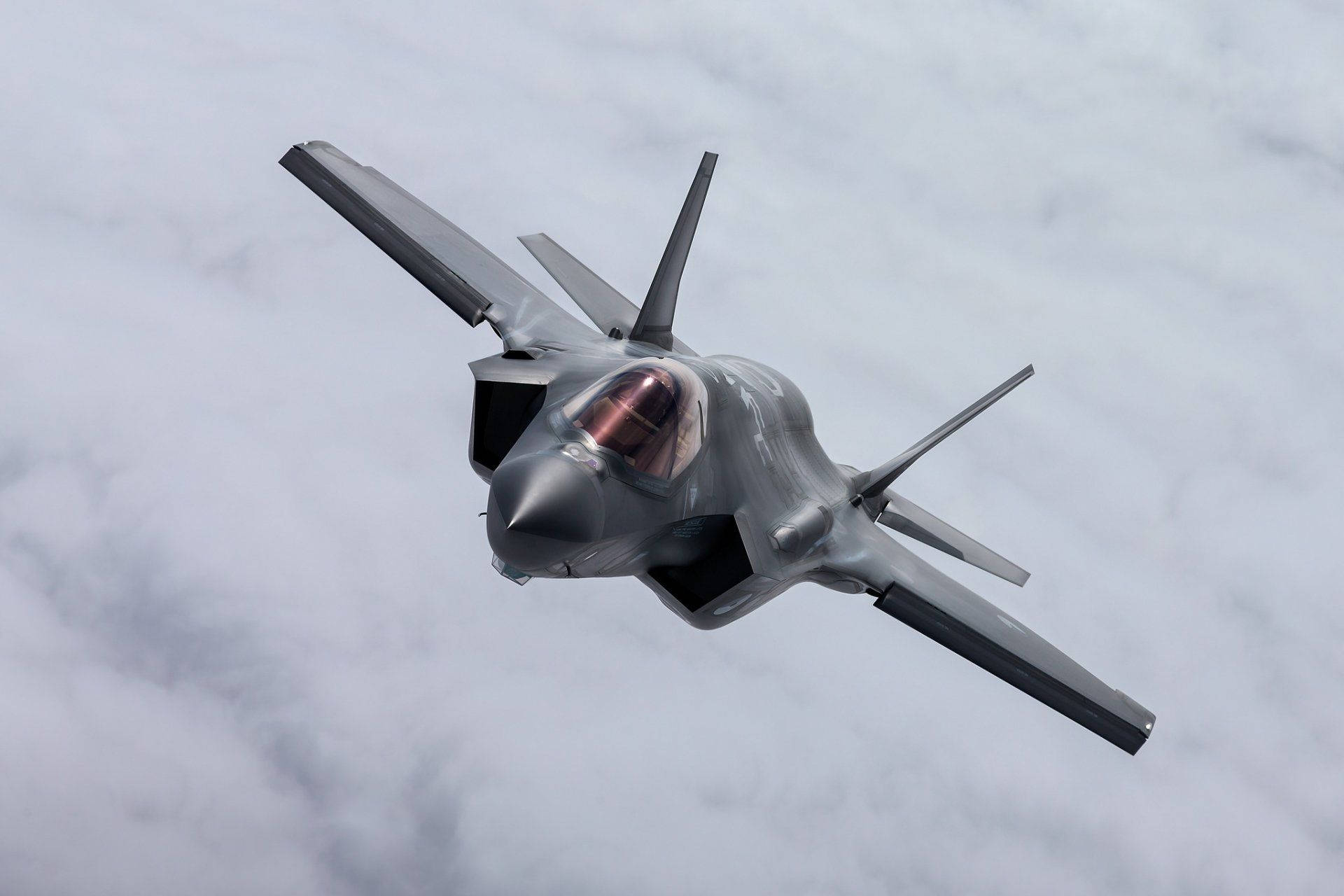 F-35a Fighter Jet In Action Background