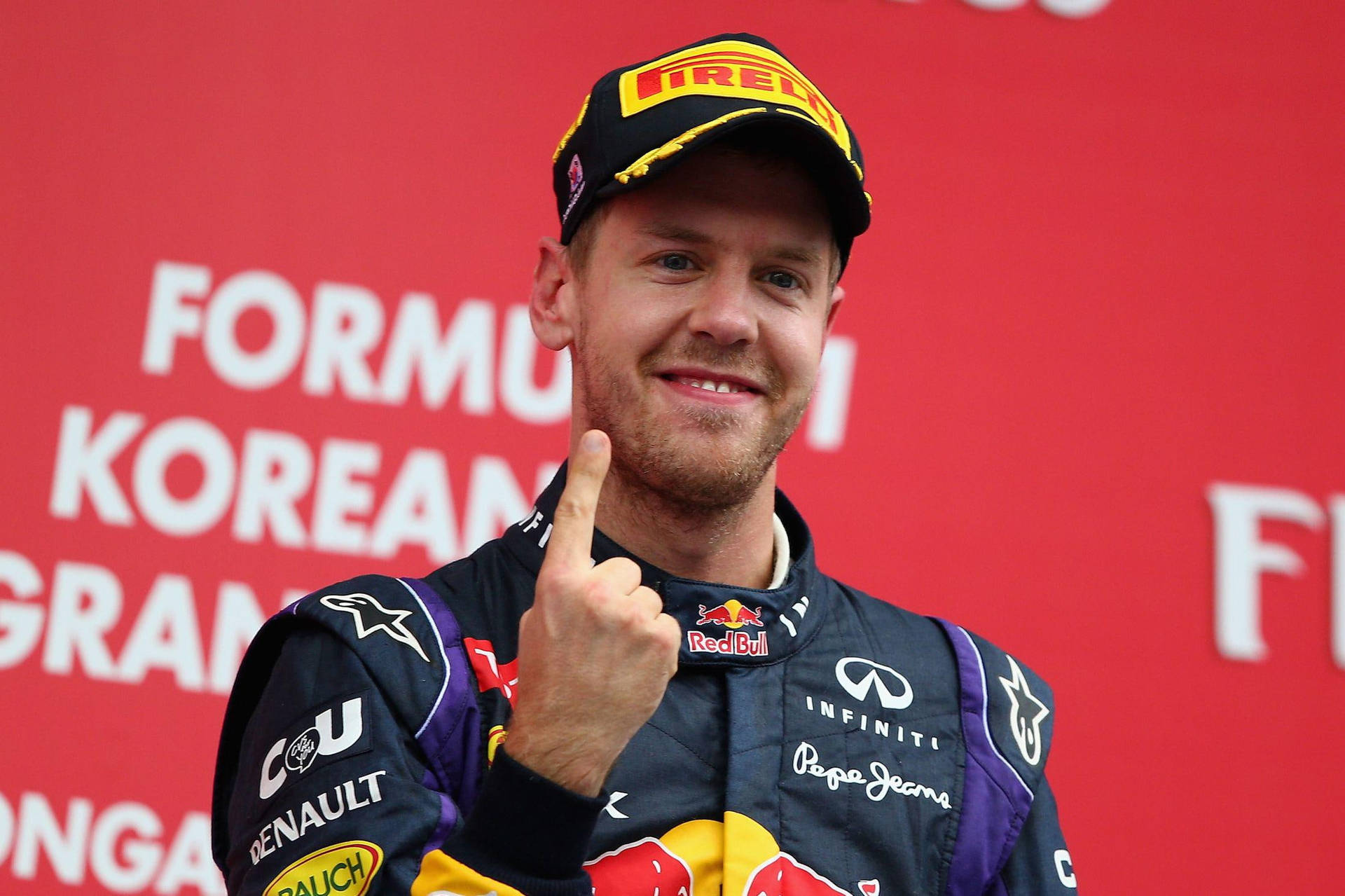F1 Champion Sebastian Vettel Celebrating Victory Background
