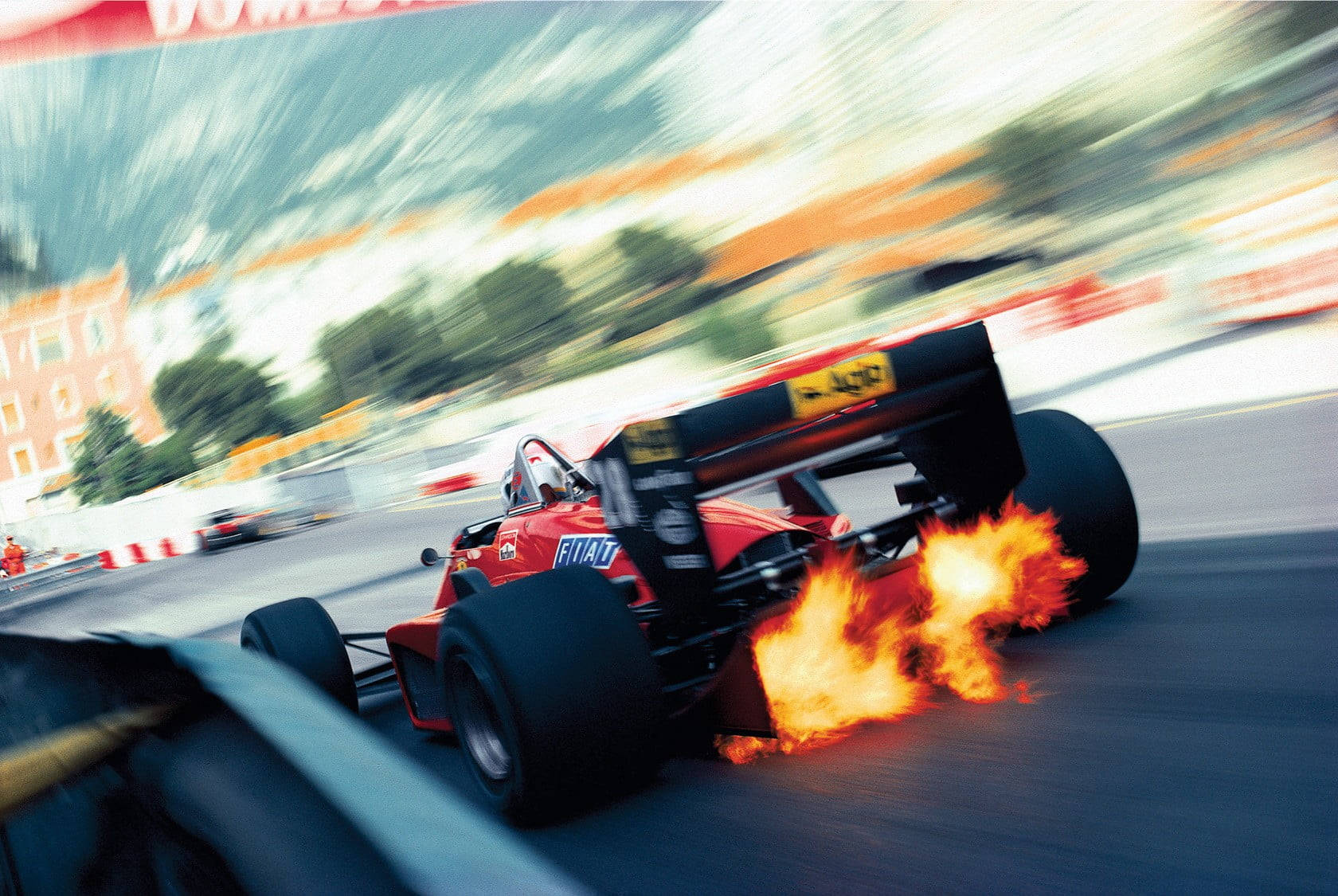 F1 Racing Car Exhaust Flames Background