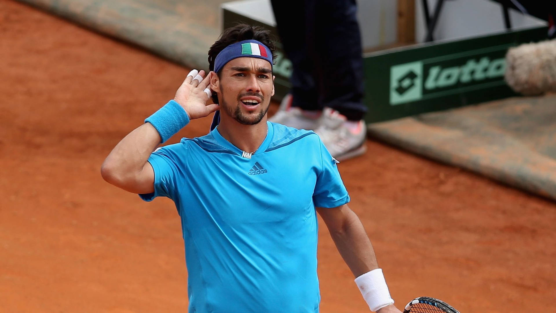 Fabio Fognini Ear Celebration Background