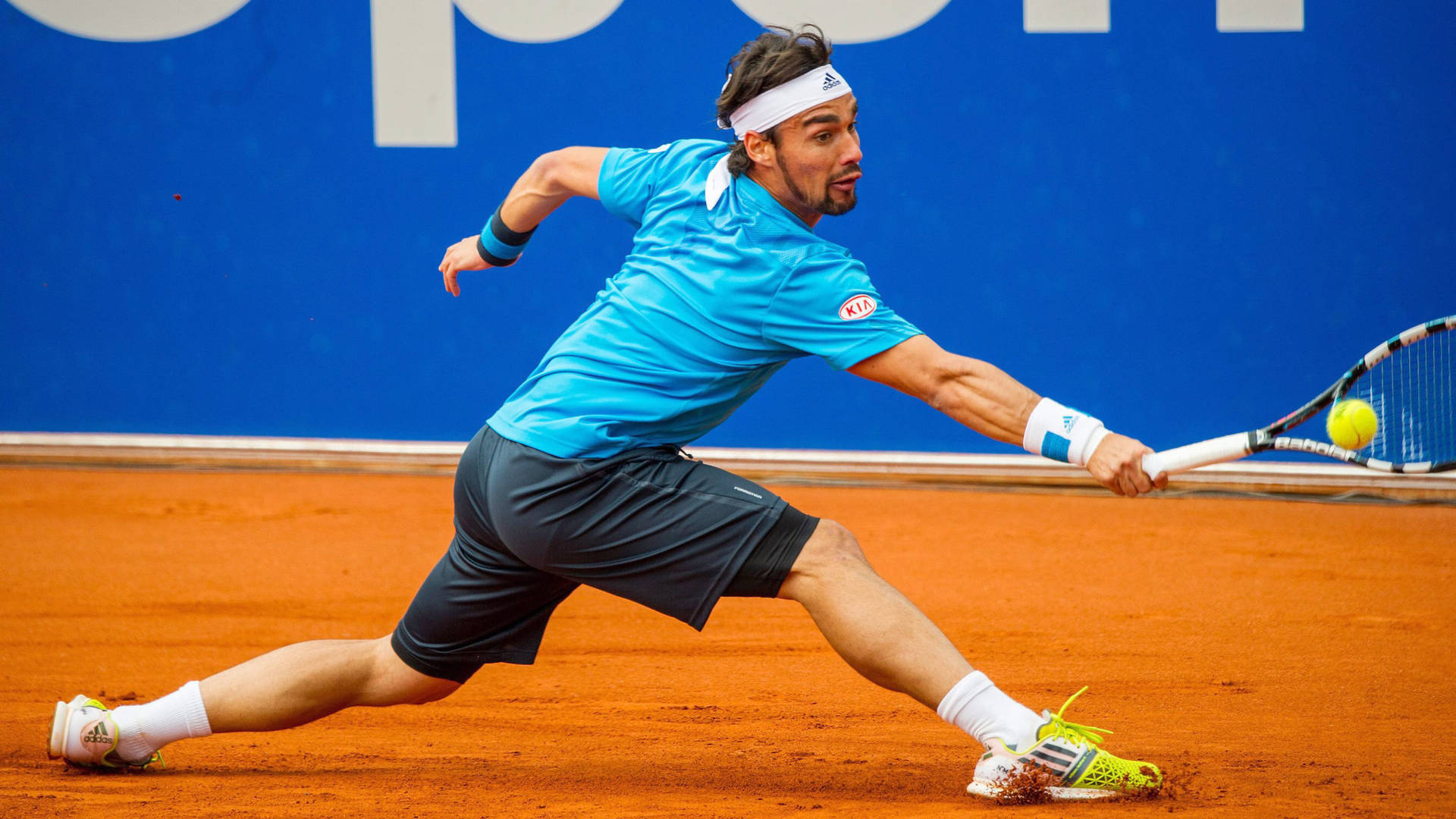 Fabio Fognini In Action On The Tennis Court Background