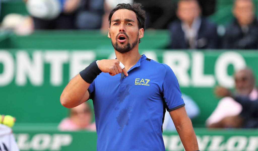 Fabio Fognini Showcasing His Skills On The Tennis Court Background