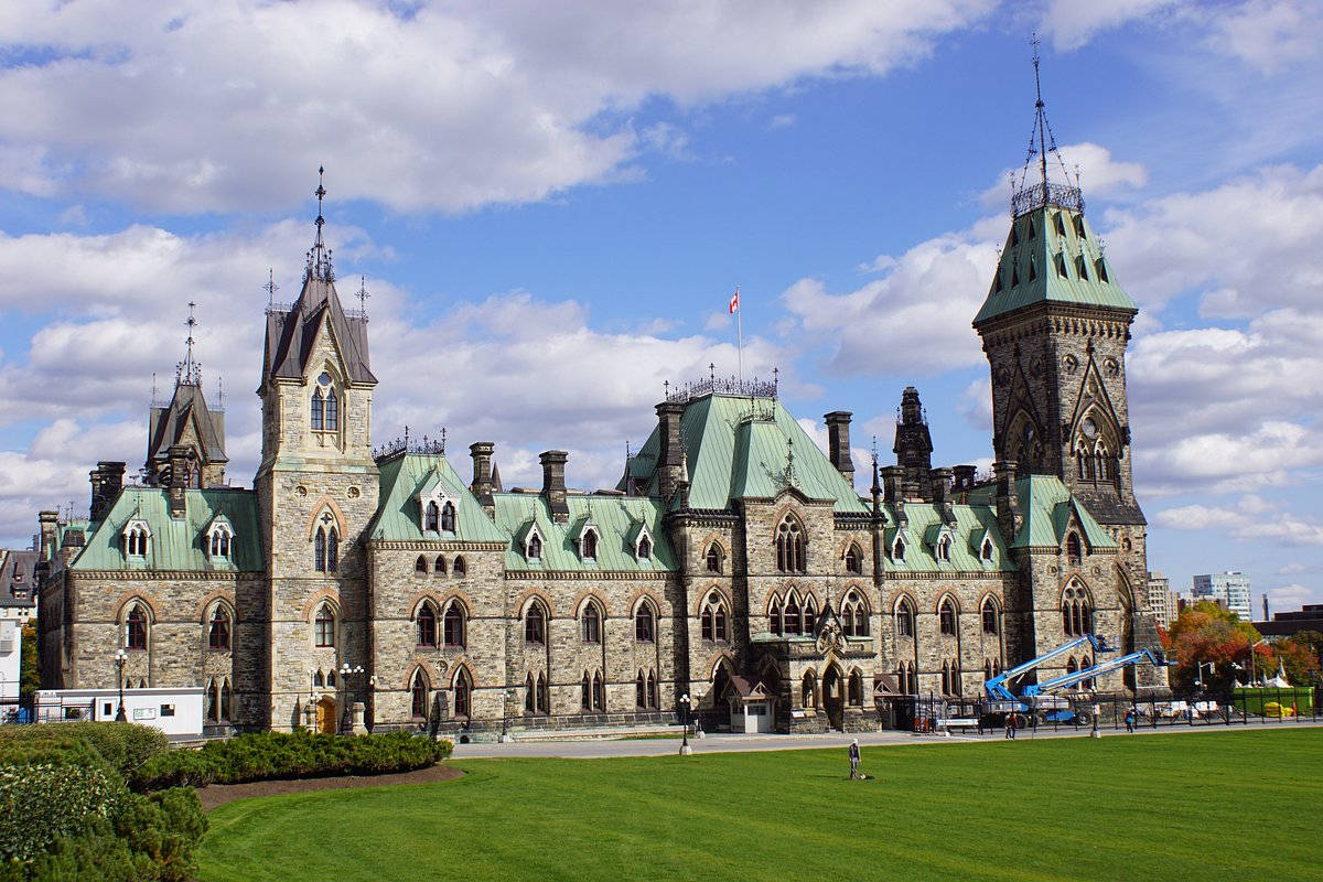 Facade Of The Parliament Hill In Ottawa Background