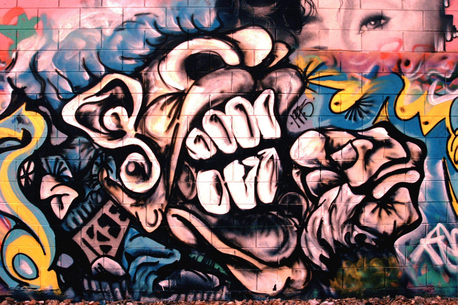 Face Graffiti On Brick Wall Background