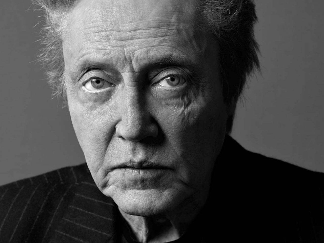 Face Of Christopher Walken In Greyscale Background