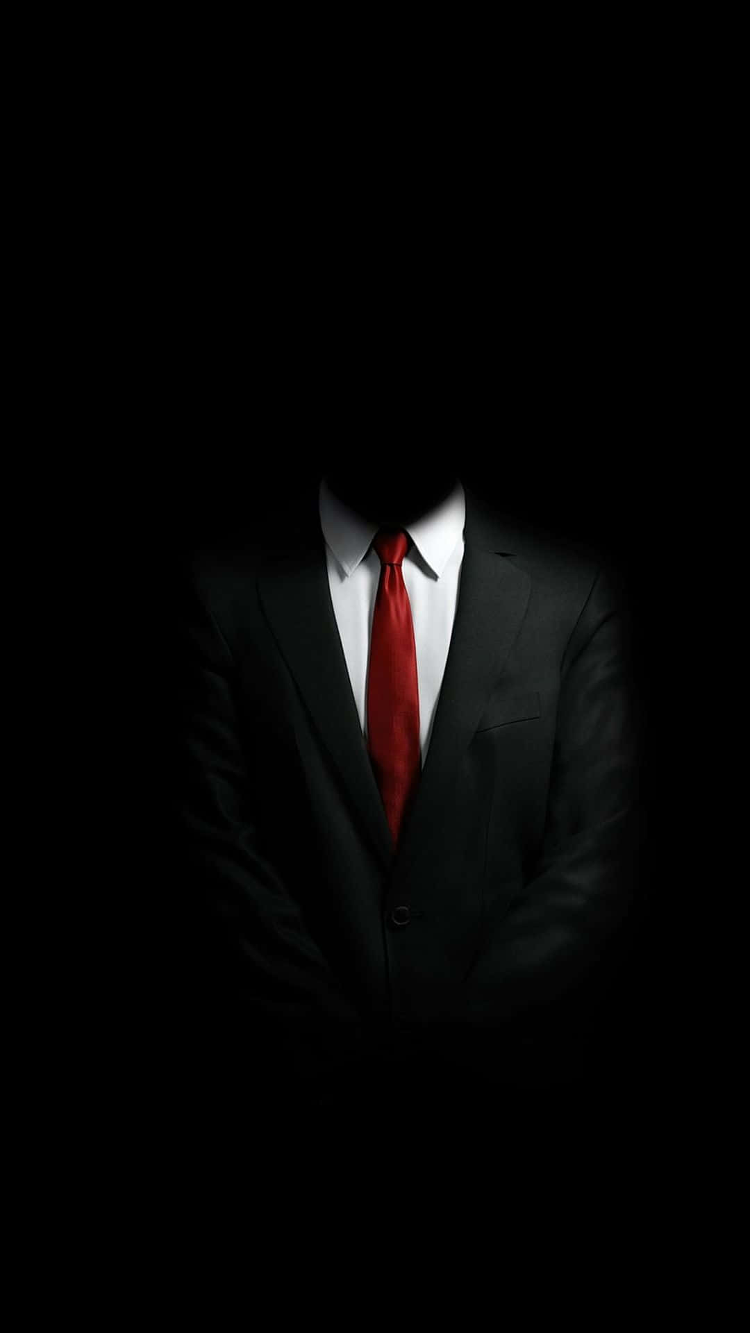 Faceless Man In Suit With Red Necktie Background