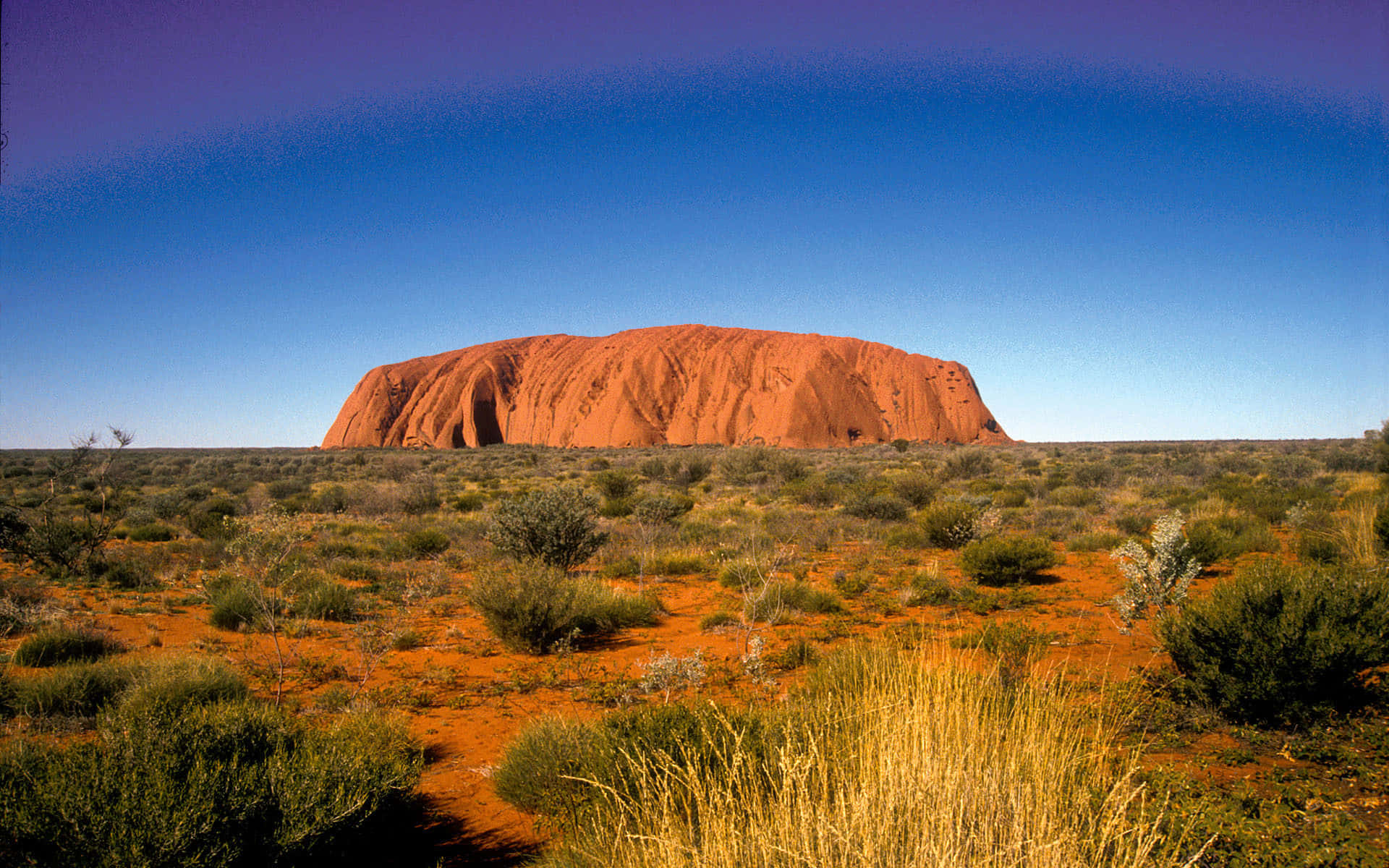 Faded Blue Sky Uluru Sandstone Background