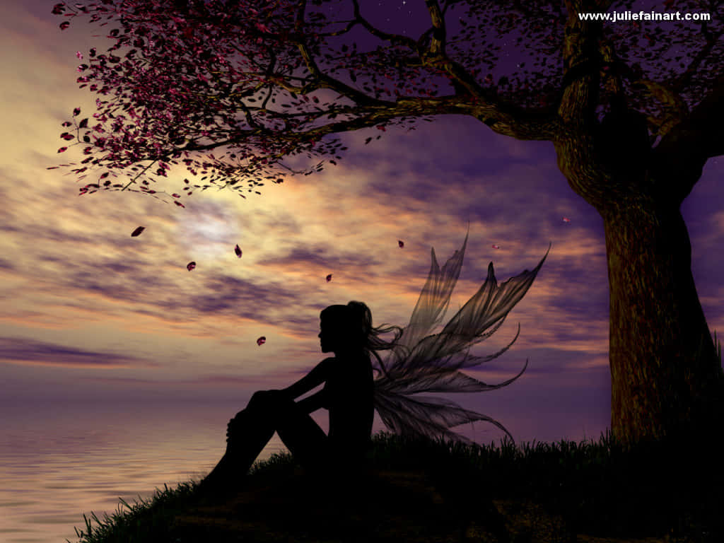 Fairy Sitting Under A Tree At Sunset Background