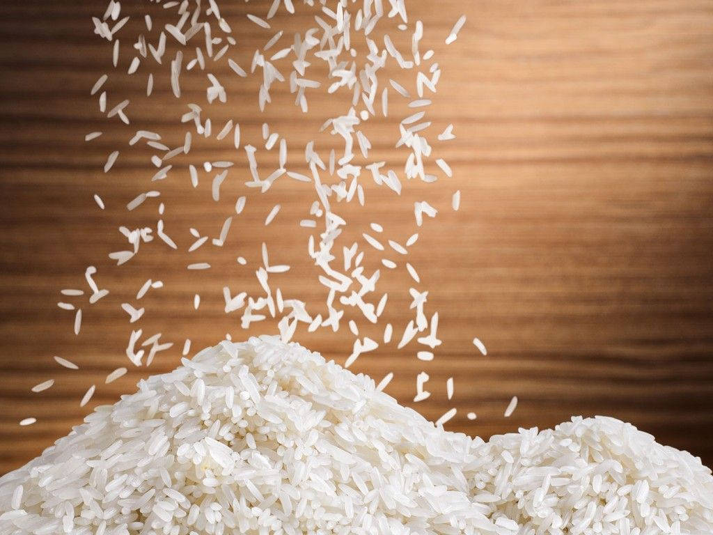 Falling Rice Into A Mound