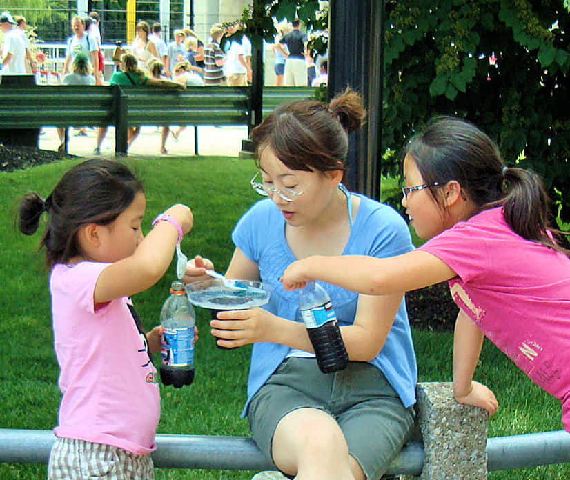 Family Enjoying Outdoor Snack Background