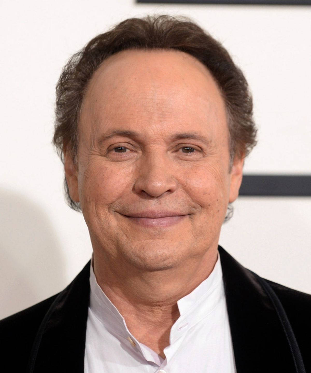 Famous American Actor Billy Crystal Light Smile Background