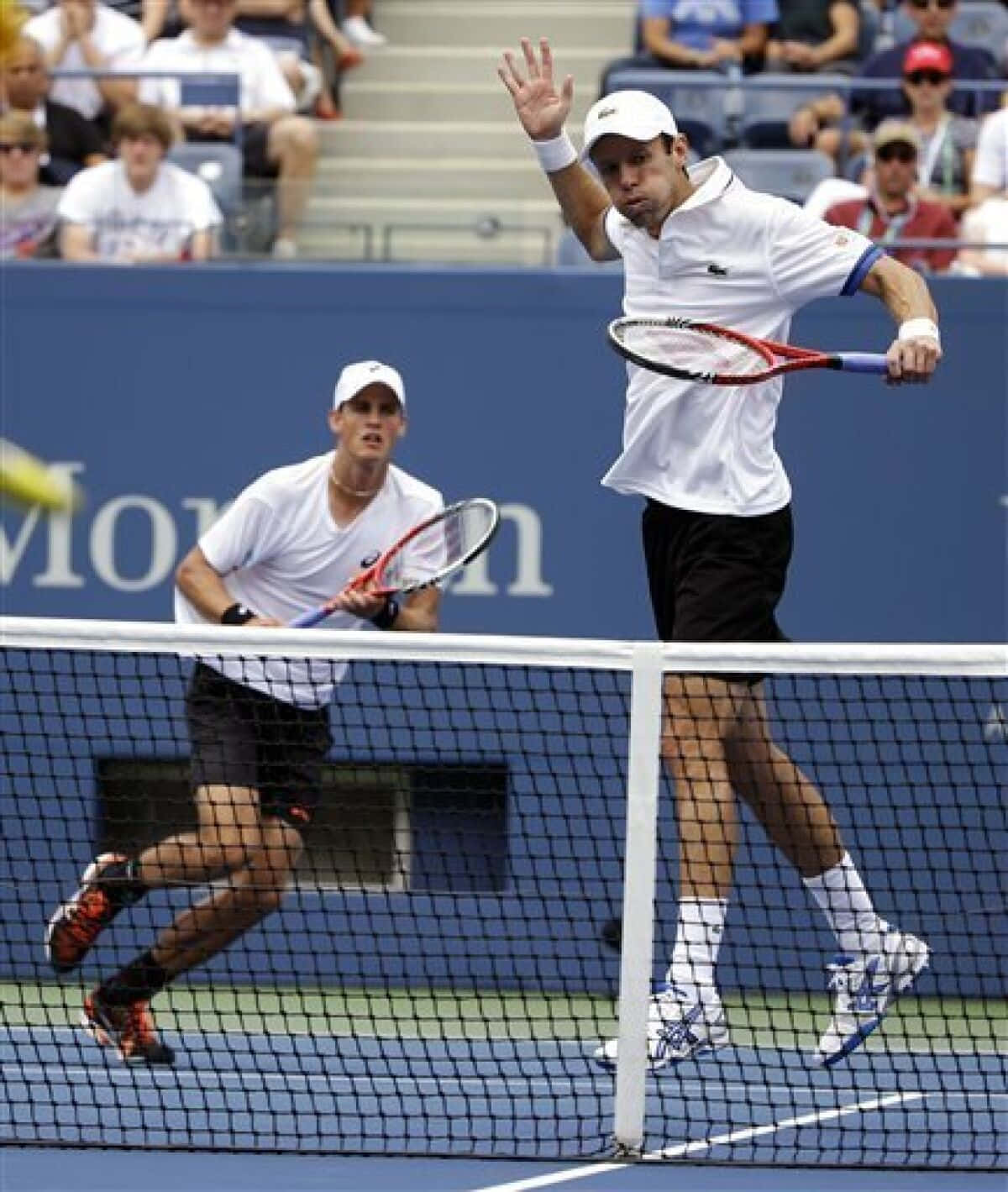 Famous Tennis Player Daniel Nestor With His Partner At The Us Open Background