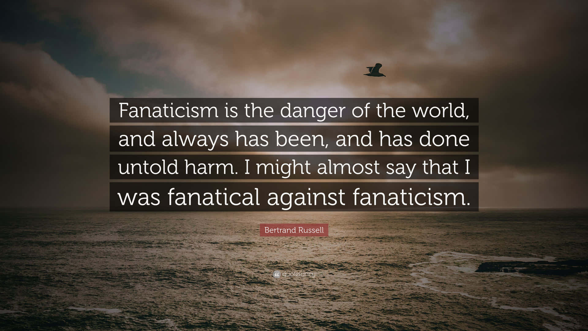 Fanaticism Quote Over Ocean Backdrop Background