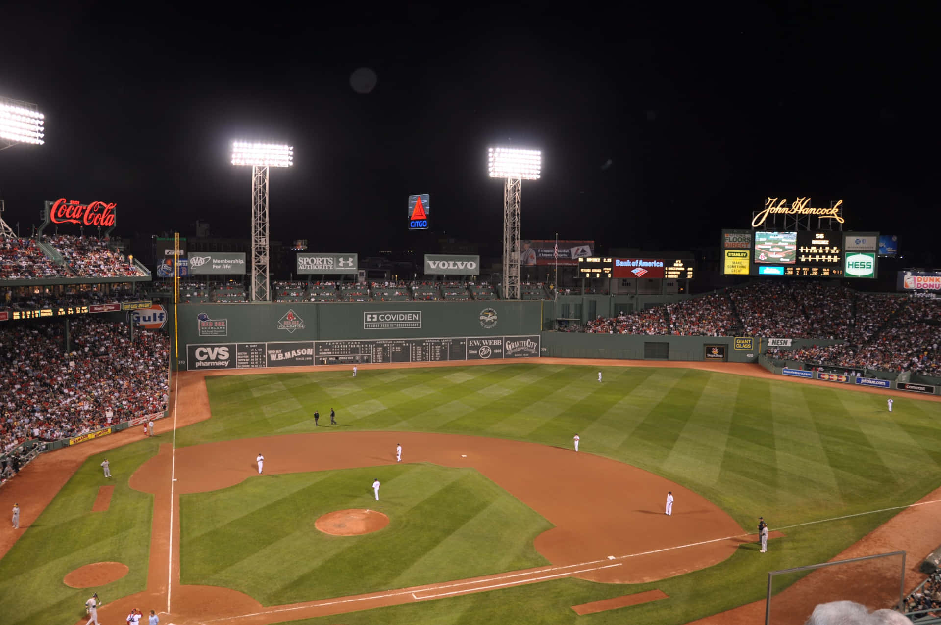 Fans Watching The Game At Fenway Park Background