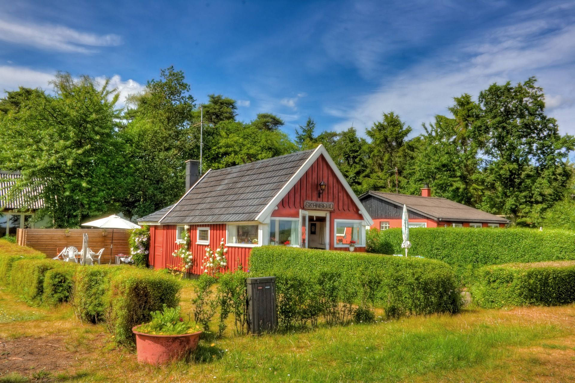 Farmhouse Painted In Red Background