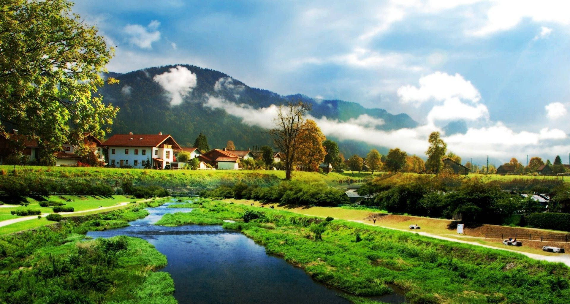 Farmhouse With Scenic Mountain Range