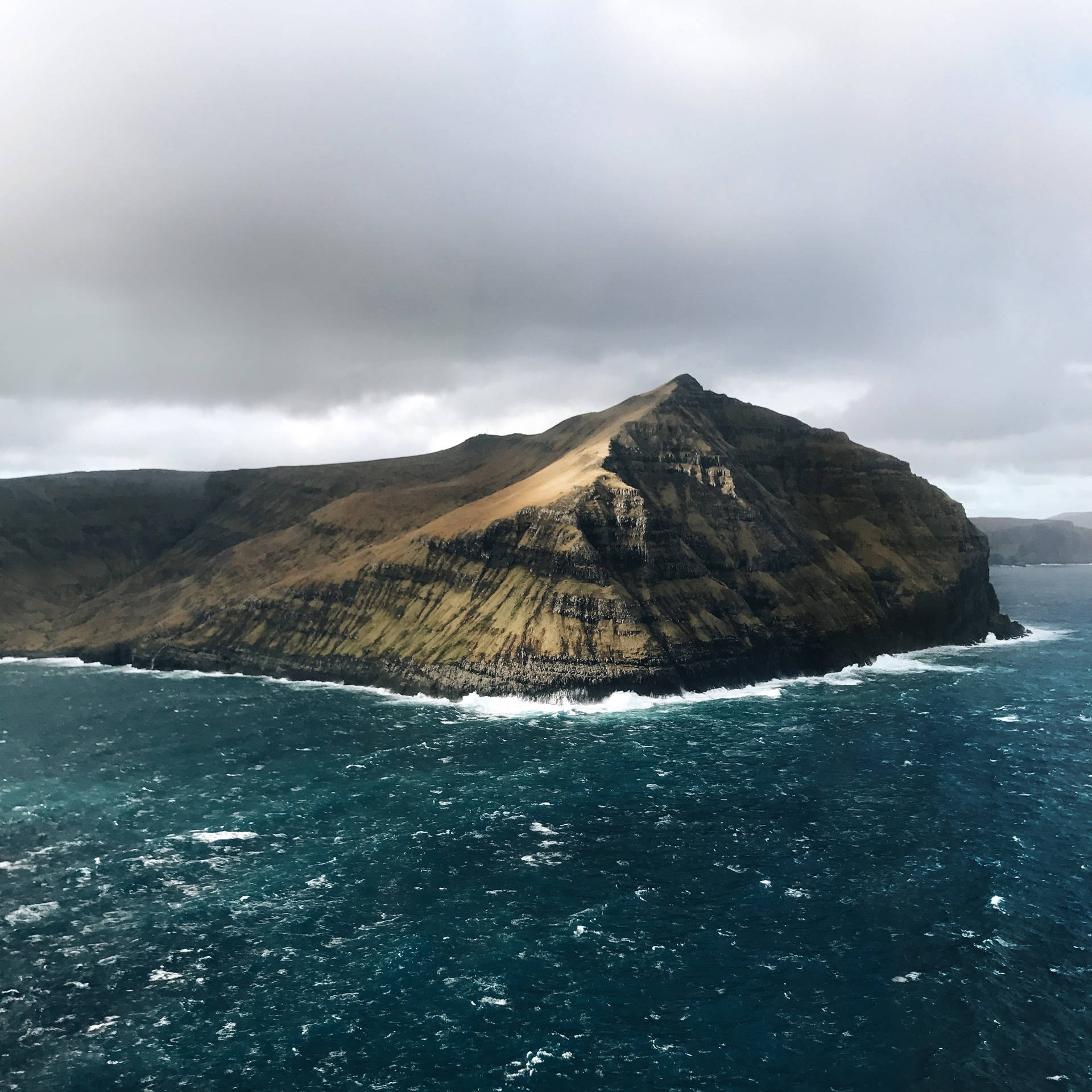 Faroe Islands Rocky Cliff Background