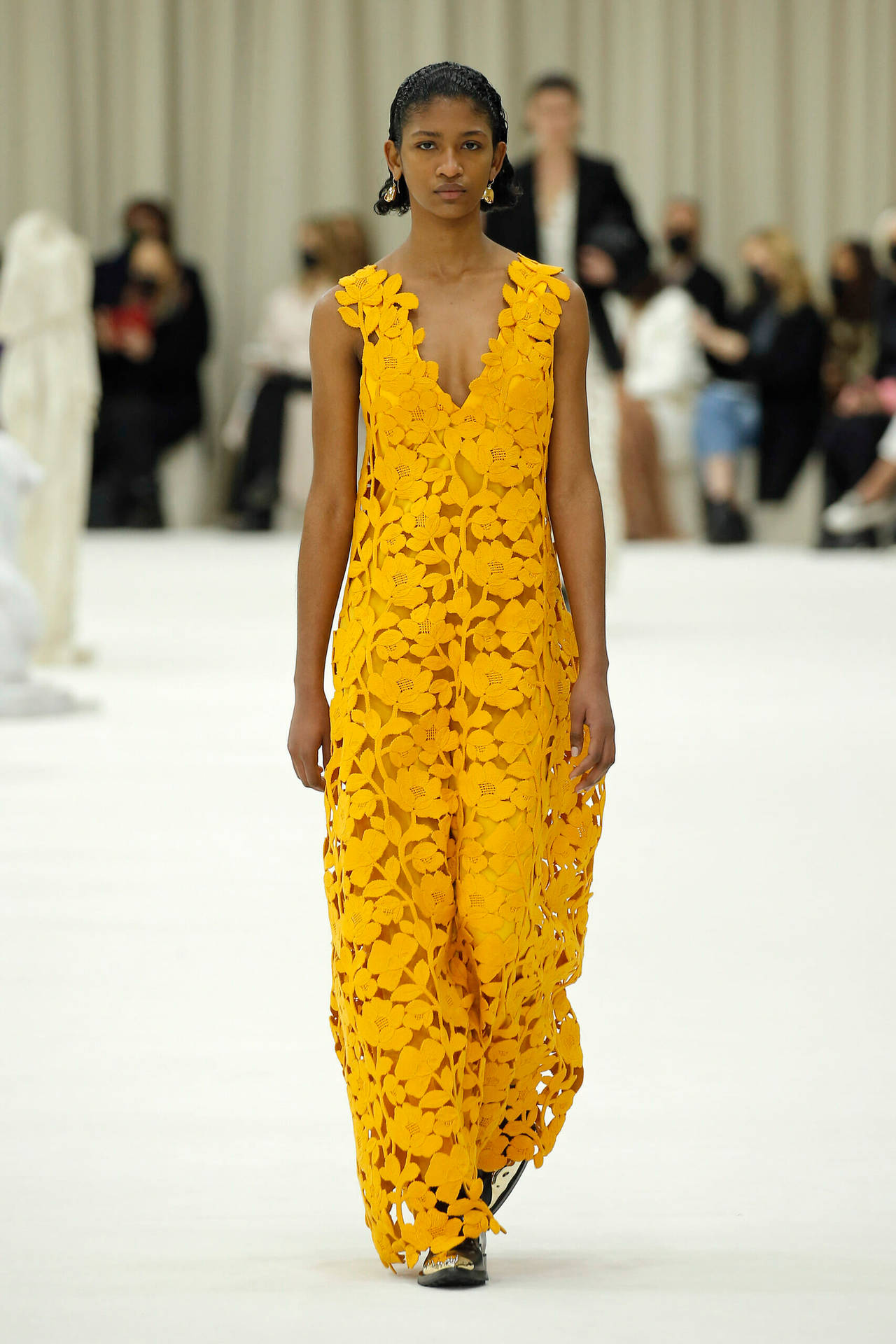 Fashion-forward Elegance With Jil Sander's Yellow Jumpsuit