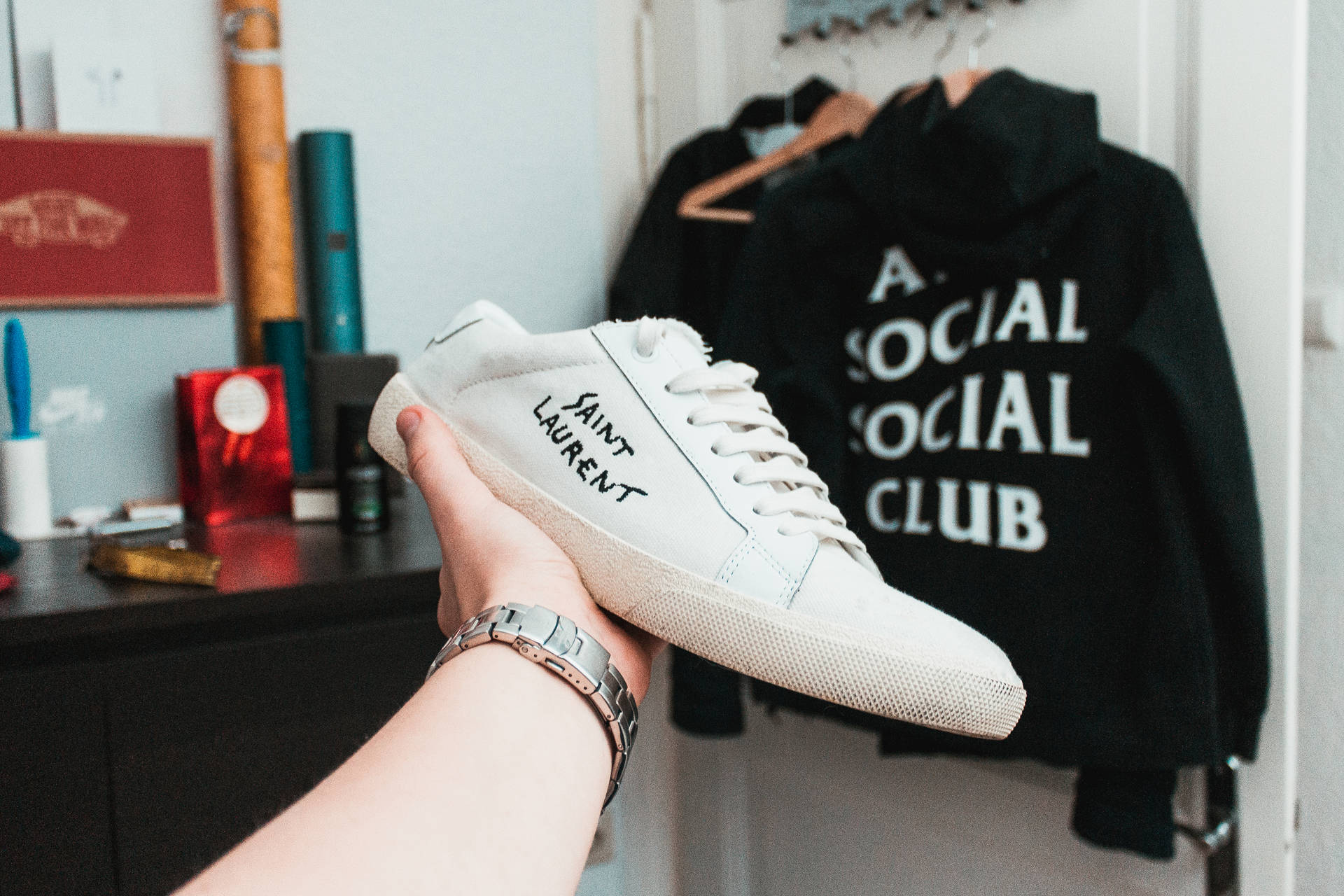 Fashion Forward With Anti Social Social Club Hoodie And Cool Sneakers Background