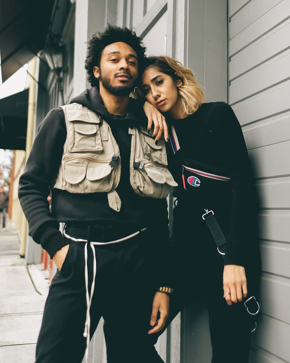 Fashionable Interracial Couple Posing Background