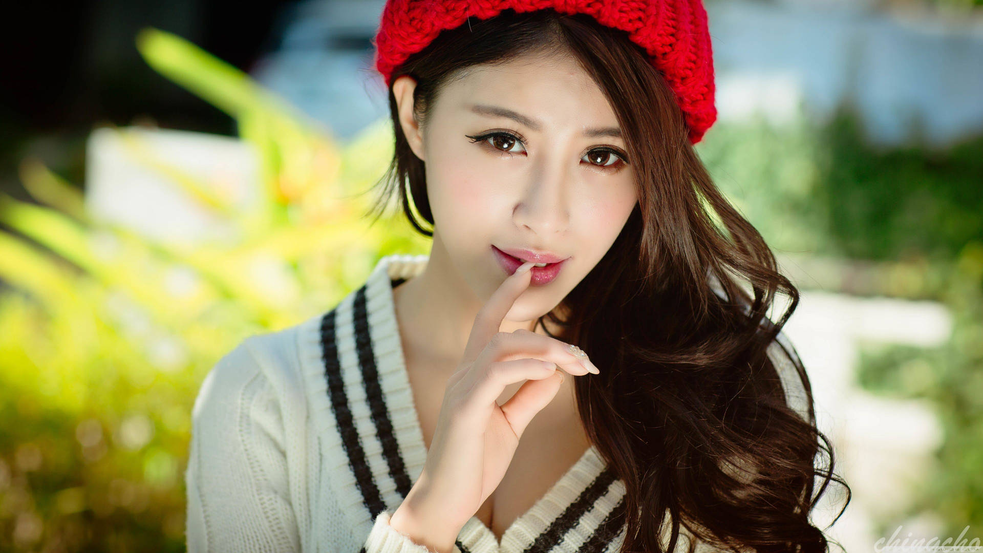 Fashionable Korean Girl In Red Beanie Background