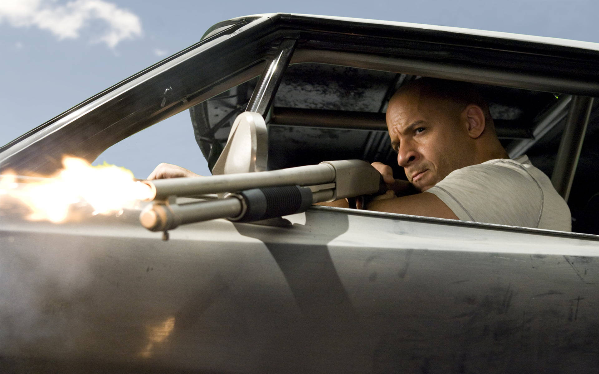 Fast And Furious Dom With Shotgun Background