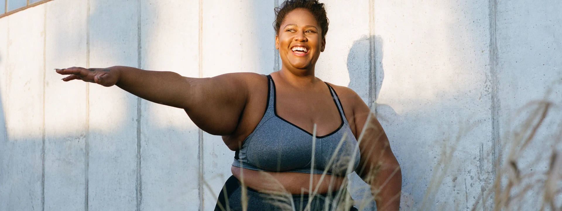 Fat Black Woman Exercising While Smiling Background