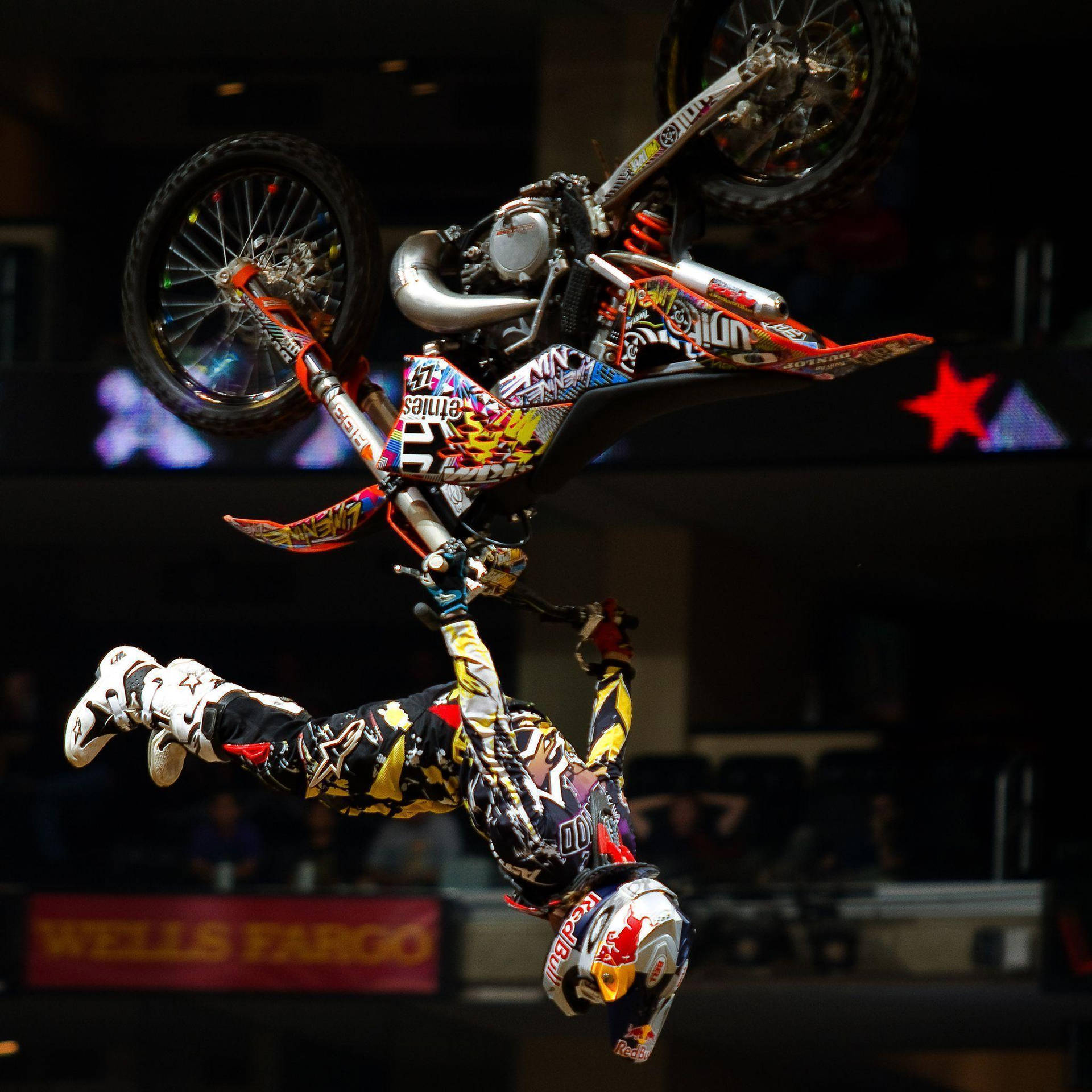 Fearless Motocross Rider Soaring In The Sky At X Games