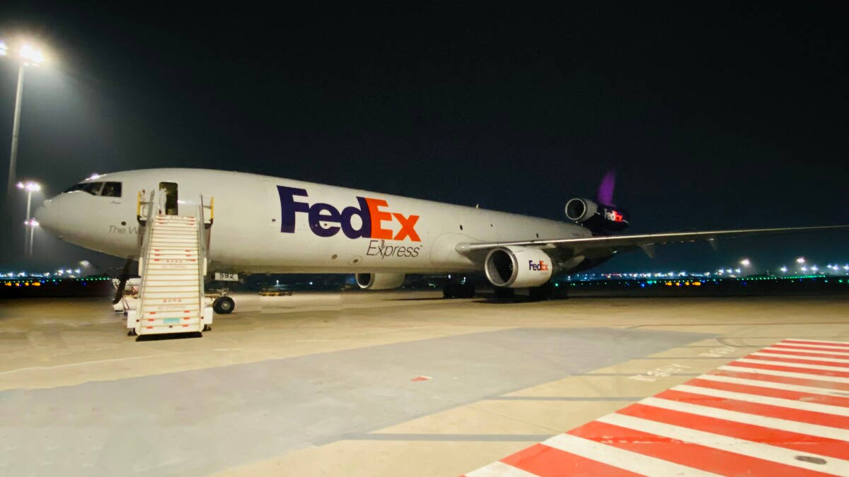 Fedex Aircraft In Landing Zone Background