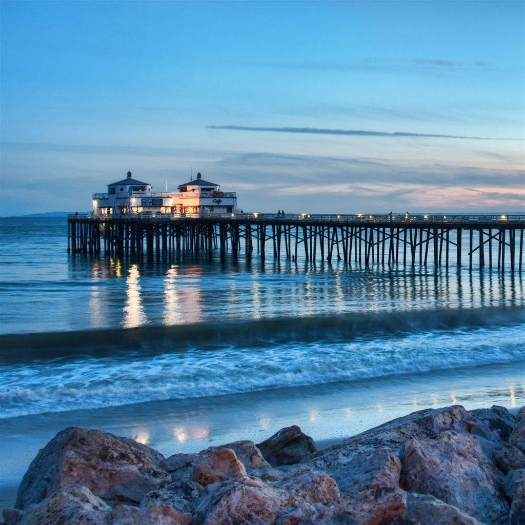 Feel The Eternal Sunshine Of California At Picture-perfect Malibu Background