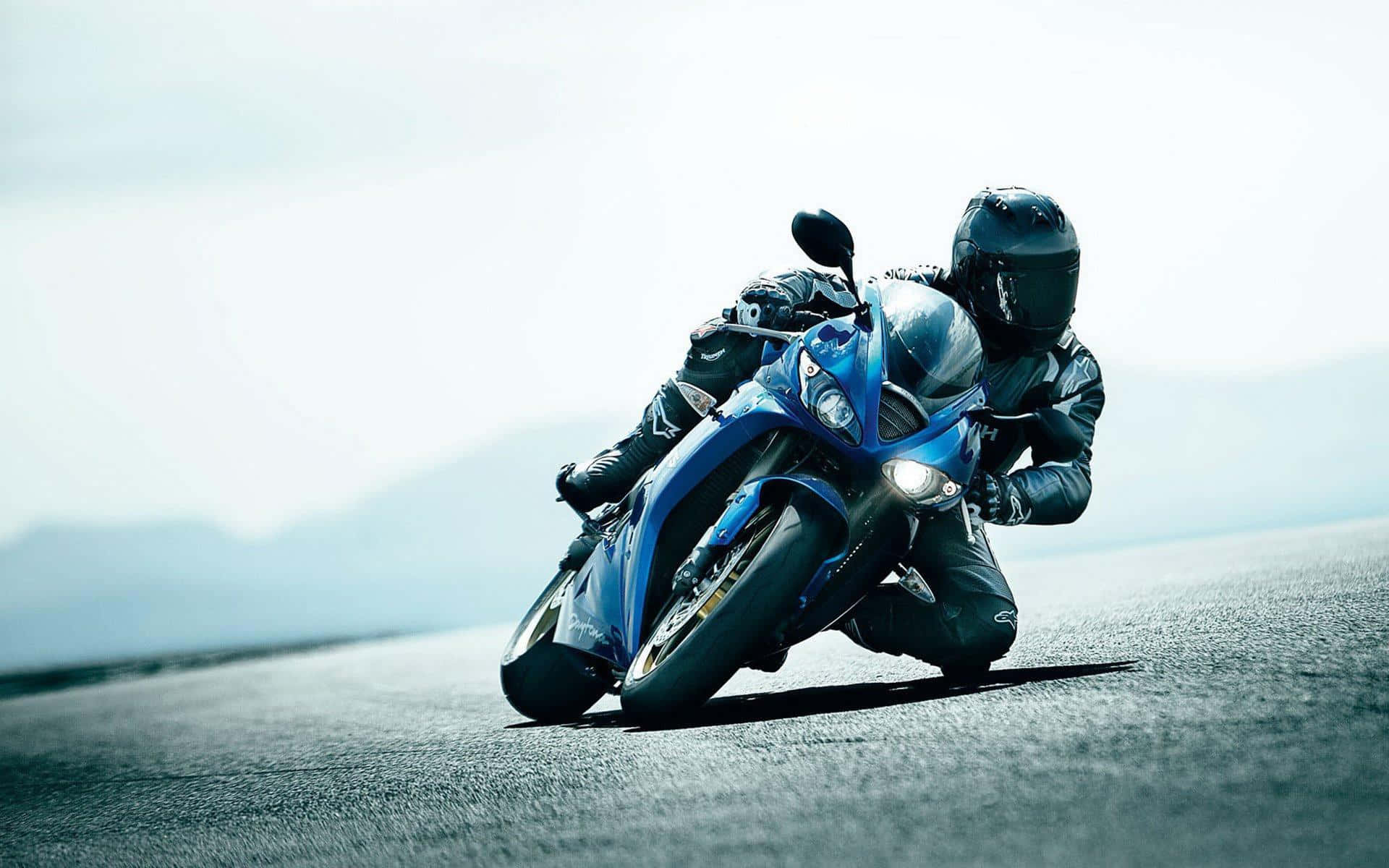 Feel The Freedom Of The Open Road On An Hd Motorcycle Background